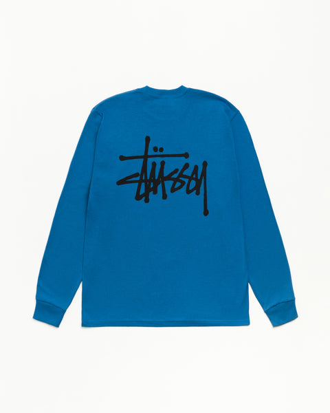 Basic Stüssy LS 티, 블루 컬러의 롱슬리브 코튼 티셔츠, 등판에 블랙 로고 프린트